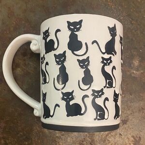 Spectrum Design Z Debossed Black Cat Silhouettes Ceramic Mug. Orange Interior